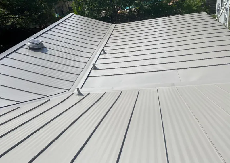 Solar attic fan installed on a metal roof for Roof Ventilation in Cromwell