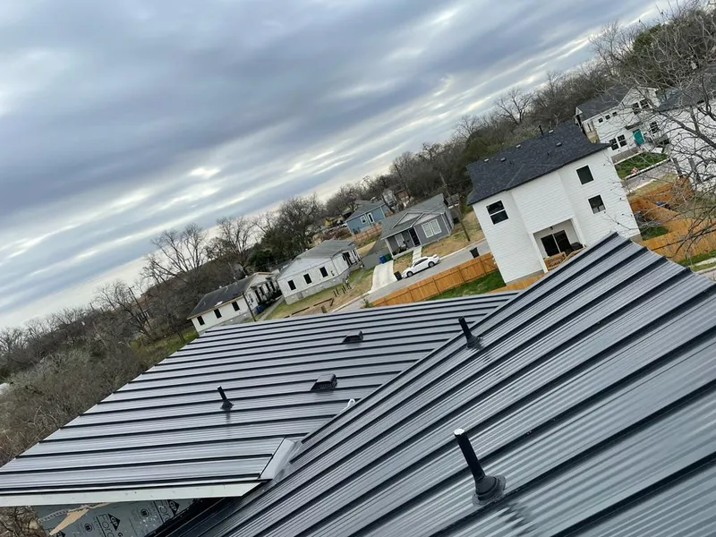 Standing seam metal roof panels with vents for Skylight Repair in Cromwell